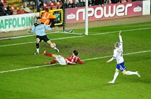 Images Dated 10th March 2012: Brett Pitman's Dramatic Save by David Marshall: Bristol City vs. Cardiff City, 10-03-2012