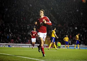 Bristol City V Derby County Prints: Brett Pitman's Euphoric Goal: A Championship Moment for Bristol City vs