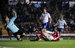 Images Dated 10th March 2012: Brett Pitman's Shot Saved by David Marshall in Bristol City vs. Cardiff City Football Match