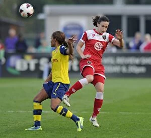 Images Dated 20th September 2014: Bristol Academy vs Arsenal Ladies: Intense Moment as Corinne Yorston Faces Off Against Alex Scott