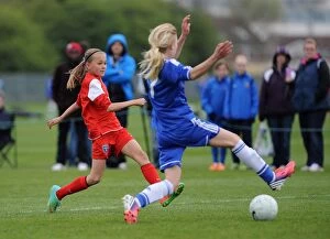 Images Dated 17th April 2014: Bristol Academy vs. Chelsea Ladies Youth: A Fierce Football Rivalry at Gifford Stadium (Youth)