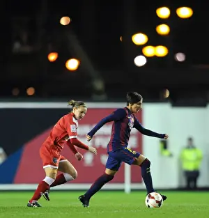 Bristol Academy's Loren Dykes Chases FC Barcelona's Marta Corredera in Women's Champions League Match