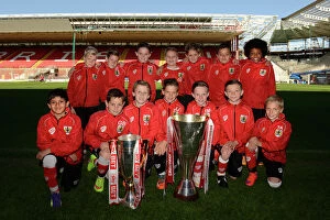 Bristol City Academy Day 2 Collection: Bristol City Academy Players Celebrate with Johnstones Paint and Sky Bet League One Trophies