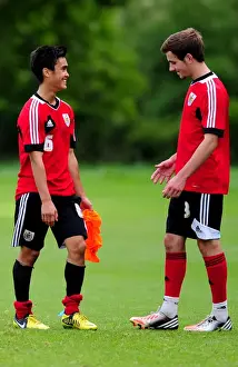 Framed Print : Bristol City Academy Training: Miles John and Lewis Hall Focused on the Pitch