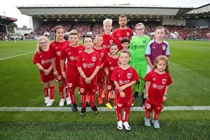 Images Dated 27th August 2016: Bristol City Captain Gary O'Neil with Mascots at Ashton Gate Stadium during Bristol City vs Aston