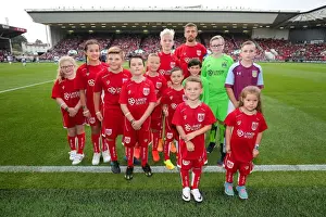 Bristol City V Aston Villa Prints: Bristol City Captain Gary O'Neil with Mascots at Ashton Gate Stadium during Bristol City vs Aston Villa
