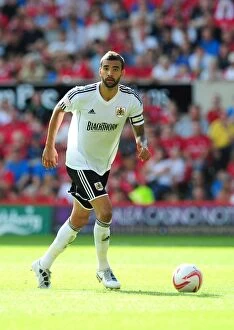 Images Dated 18th August 2012: Bristol City Captain Liam Fontaine Leads the Charge Against Nottingham Forest in Championship Clash