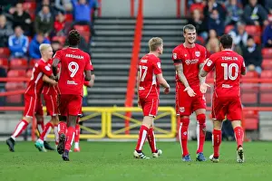 Framed Print : Bristol City Celebrate First Goal Against Blackburn Rovers: Aden Flint, Lee Tomlin, and Aaron Wilbraham Rejoice after Wilbraham's Score (1-0) - Sky Bet EFL Championship, Ashton Gate Stadium, Bristol, England (2016)
