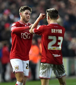 Images Dated 16th January 2016: Bristol City Celebrate Win Against Middlesbrough: Wes Burns and Joe Bryan Rejoice on Pitch