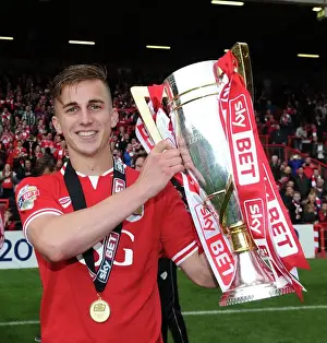 Bristol City Celebrates Promotion to Sky Bet Championship with Joe Bryan and League One Trophy