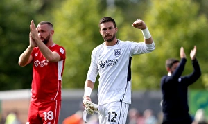 Bristol City Celebrates Win Against Burton Albion: Richard O'Donnell and Aaron Wilbraham Rejoice at Pirelli Stadium (13-08-2016)