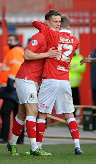 Bristol City Celebrates Win Against Fleetwood Town: Matt Smith and George Saville Rejoice on the Field