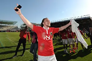 Title Prints: Bristol City Clinch League Title: Luke Ayling's Euphoric Moment at Ashton Gate