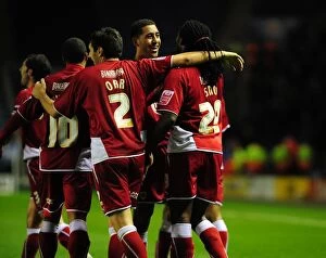 Images Dated 8th December 2009: Bristol City: Evander Sno and Teammates Celebrate Historic Win Against Leicester City