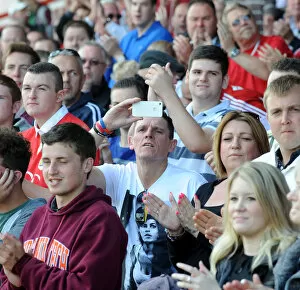 Images Dated 16th August 2014: Bristol City Fan Cheers at Ashton Gate during Bristol City vs Colchester United