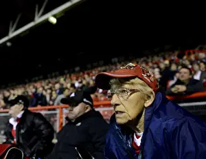 Framed Print : A Bristol City Fan Intently Watches the Action Unfold at Ashton Gate Framed Print : A Bristol City Fan Intently Watches the Action Unfold at Ashton Gate