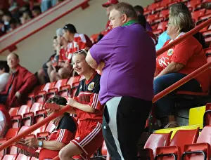 12 15 Prints: Bristol City Fan Smiles at Bramal Lane Amid Sheffield United Rivalry