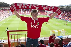 12 15 Prints: Bristol City Fan Waves Scarf at Sheffield United's Bramal Lane in League One Opener