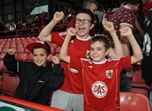 Images Dated 16th August 2014: Bristol City Fans in Action at Ashton Gate: Bristol City vs Colchester United, Sky Bet League One