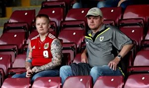 Images Dated 23rd August 2016: Bristol City Fans in Action at Glanford Park during EFL Cup Match, August 2016
