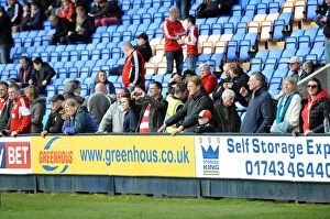 Images Dated 8th March 2014: Bristol City Fans in Action at Shrewsbury Town's New Meadow