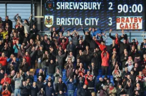 Framed Print : Bristol City Fans in Action at Shrewsbury Town's New Meadow, March 2014 Framed Print : Bristol City Fans in Action at Shrewsbury Town's New Meadow, March 2014