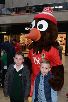 Images Dated 11th March 2015: Bristol City Fans Celebrate at Cabot Circus with Scrumpy after JPT Victory, 2015