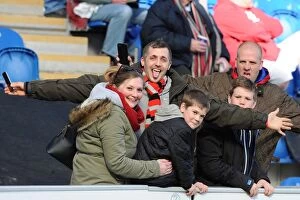 Images Dated 22nd March 2014: Bristol City Fans Cheering at Colchester United vs. Bristol City, Sky Bet League One (22/03/2014)