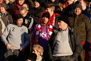Images Dated 3rd January 2015: Bristol City Fans Cheering at Doncaster Rovers Keepmoat Stadium during FA Cup Third Round Proper