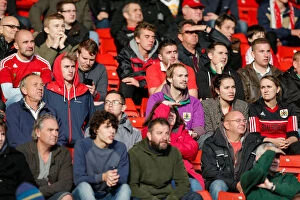 Images Dated 25th October 2014: Bristol City Fans Show Nervous Anticipation at Barnsley vs. Bristol City Football Match