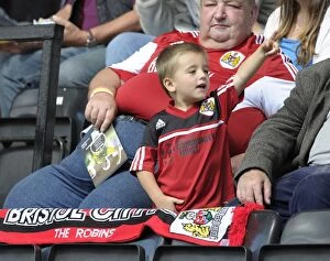 Images Dated 31st August 2014: Bristol City Fan's Passionate Support at Notts County vs. Bristol City