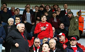 Wigan Athletic V Bristol City Prints: Bristol City Fans Rally at Wigan Athletic vs