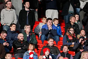 Images Dated 25th October 2014: Bristol City Fans Showing Nervous Anticipation at Barnsley's Oakwell Stadium, 2014