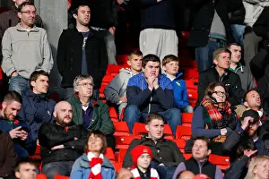 Bristol City Fans Showing Nervous Anticipation at Barnsley's Oakwell Stadium, 2014