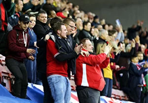 Images Dated 11th March 2017: Bristol City Fans Unwavering Passion at Wigan Athletic vs. Bristol City