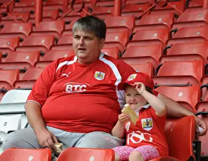 Bristol City V Colchester United Prints: Bristol City Fans Watch Intently as the Action Unfolds at Ashton Gate