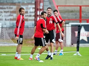 Images Dated 29th July 2012: Bristol City FC: Cole Skuse and Brett Pitman Embrace During Pre-Season Training (Scotland Tour)