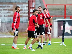 Training Prints: Bristol City FC: Cole Skuse and Brett Pitman Embrace During Pre-Season Training (Scotland Tour)