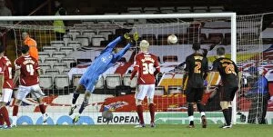 Images Dated 3rd December 2011: Bristol City FC: David James Unable to Save Malaury Martins Free-Kick Against Middlesbrough