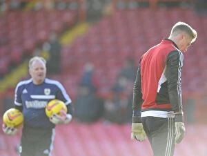 Images Dated 1st February 2014: Bristol City FC: Goalkeeper Simon Moore and Coach David Coles Warming Up Ahead of Match (01/02/2014)