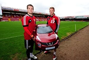 Images Dated 3rd August 2012: Bristol City FC Goalkeepers Tom Heaton and Dean Gerken with Baby Duke from Wessex Garages at