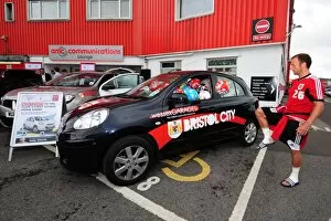 Images Dated 3rd August 2012: Bristol City FC: Jody Morris Fills Car Window with Soccer Ball at Open Day (Joe Meredith)