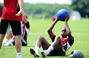 Pre-season Training Prints: Bristol City FC: Kalifa Cisse Dives into Intense Pre-Season Training