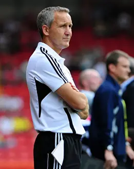 Season 11-12 Prints: Bristol City FC: Keith Miljen Leads the Charge Against West Brom in Championship Clash at Ashton Gate