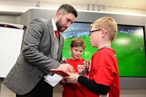 Bristol City V Fulham Prints: Bristol City FC: Lee Johnson Signs Autographs for Mascot Before Fulham Match (220217)