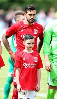 The Grove Prints: Bristol City FC: Marlon Pack and Mascot Prepare for Pre-Season Friendly at Hengrove Athletic