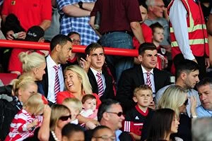 Bristol City v Cardiff City Collection: Bristol City FC: Nyatanga, Bryan, and Edwards Watch from the Stands during Bristol City vs