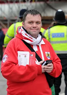 Bristol City FC: Passionate Fans in Full Swing during FA Cup Fourth Round Match against West Ham United at Ashton Gate