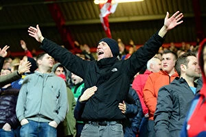 Images Dated 17th March 2017: Bristol City FC: Thrilling Championship Victory - Fans Celebrate at Ashton Gate