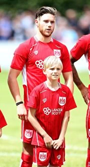 Images Dated 10th July 2016: Bristol City FC: Wes Burns and Mascot Prepare for Pre-Season Friendly against Hengrove Athletic